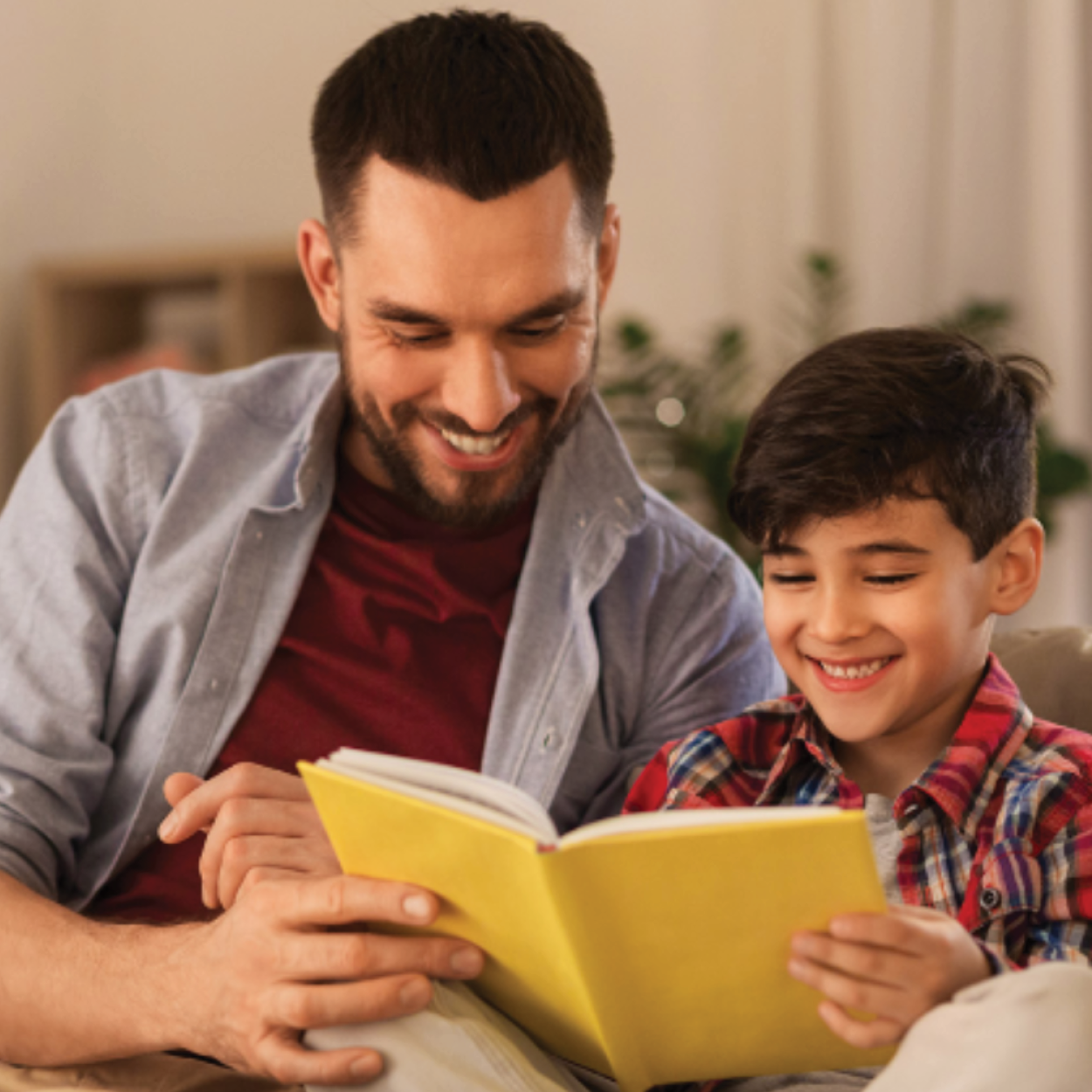 Image of parent reading aloud to child